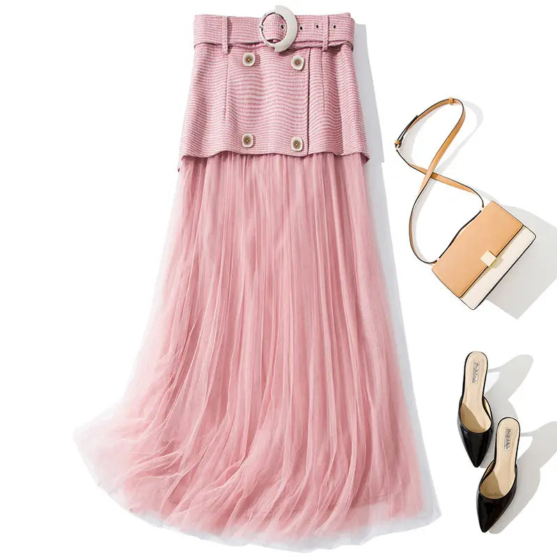 Pink pleated mesh skirt with belted top from New Women’s Belts collection.