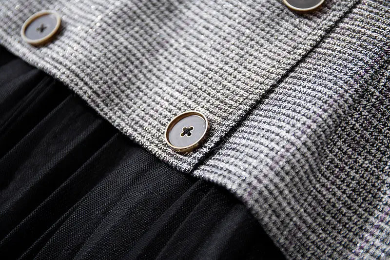 Gray tweed dress with black tulle skirt featured in New Women’s Belts collection.