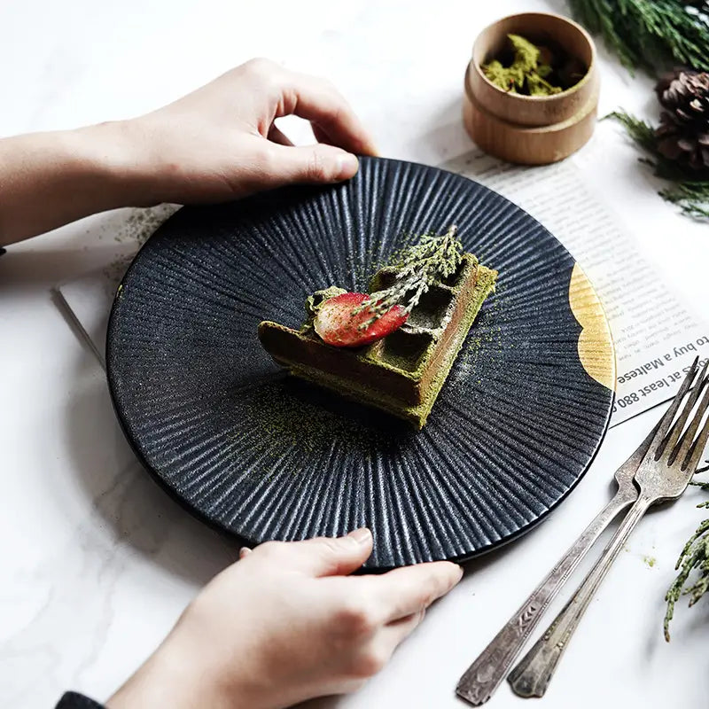 Matcha waffle on a textured black plate from Wujin Moyu Creative Tableware Set.