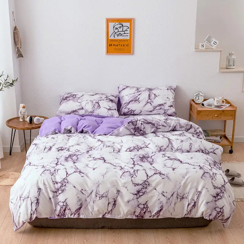 Marble-patterned bedding set featuring quilt duvet cover and pillow cases in three sets.