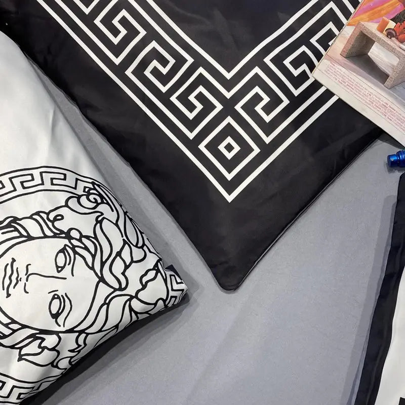 Patterned pillowcases featured in Silk Four-piece Silky Sheets Tencel Cotton Quilt Cover.