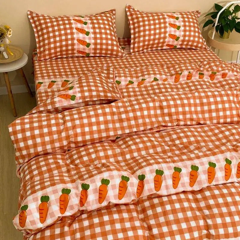 Orange and white checkered bedding set with carrot accents for student dormitory use.
