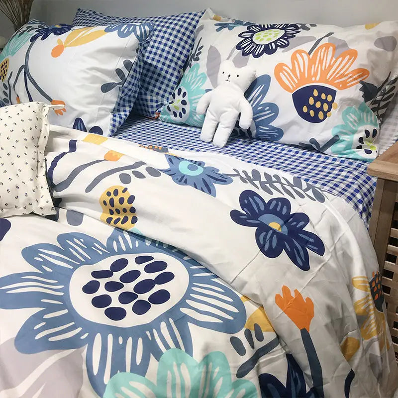 Floral bedding set showcased in a three-piece single bed sheet collection for dormitories.