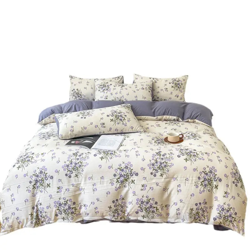Floral patterned Four-piece Bed Set Jacquard Quilt Cover Sheets for elegant bedding decor.