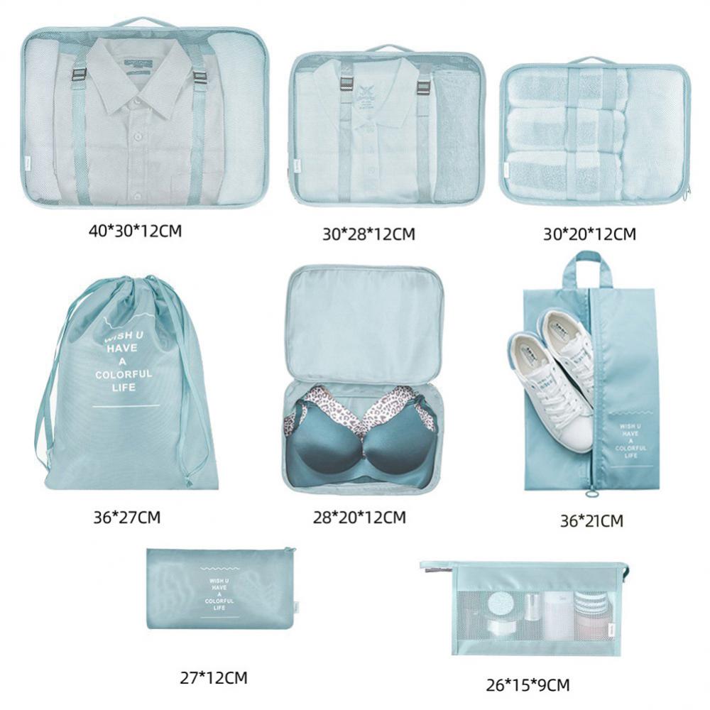 Light blue travel organizer set from 8-piece Set Luggage Divider Bag storage solution.