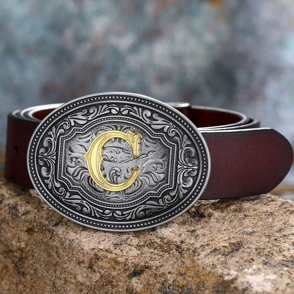 Brown leather belt featuring a silver and gold C buckle in floral design.