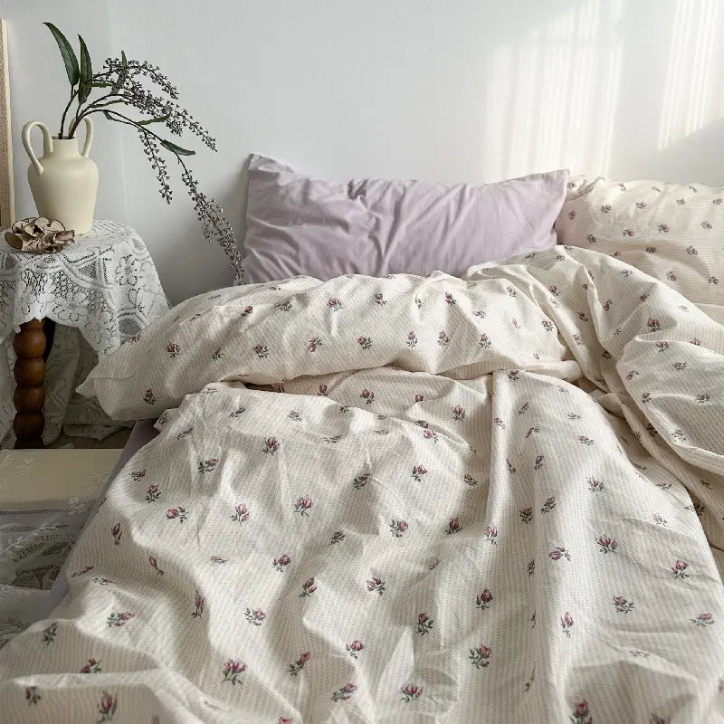Floral patterned bedding in Cotton Bed Four Piece Set of Sheets Duvet Covers.