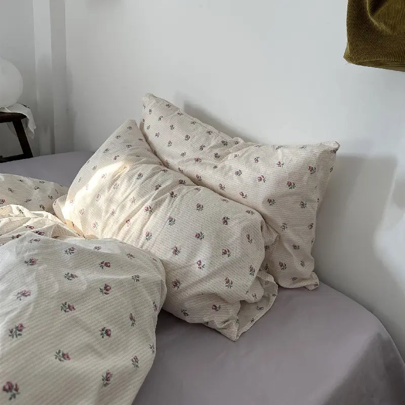 Floral patterned Cotton Bed Four Piece Set of Sheets and Duvet Covers for elegant decor.