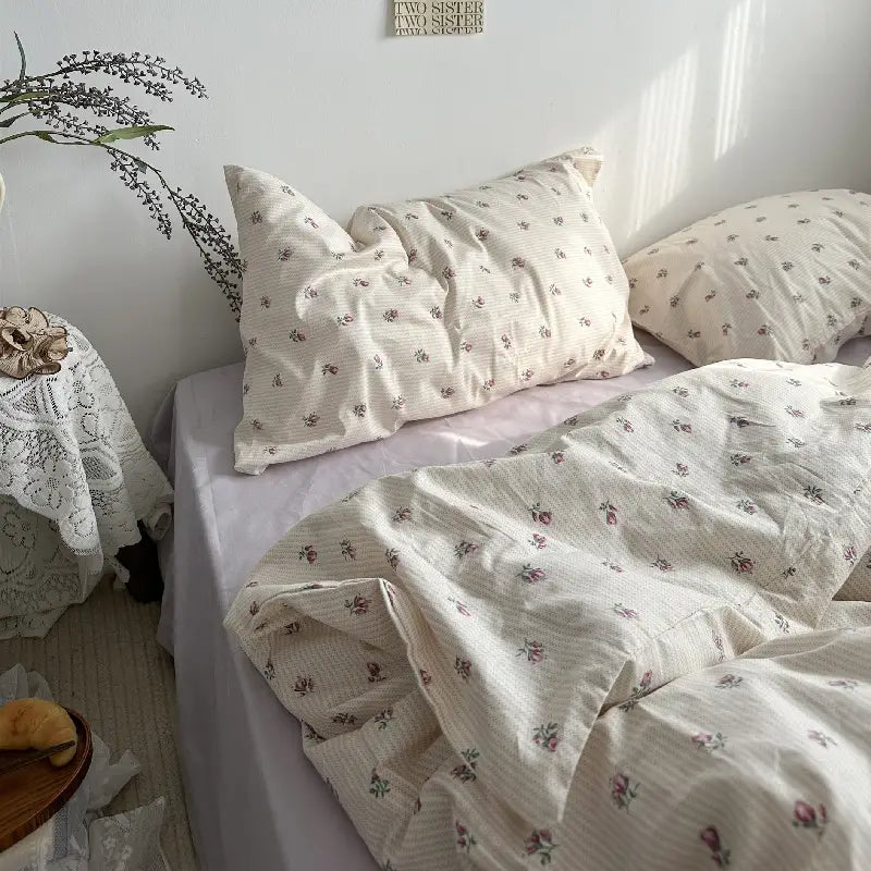 Floral striped bedding from Cotton Bed Four Piece Set of Sheets Duvet Covers Bed Sheets.
