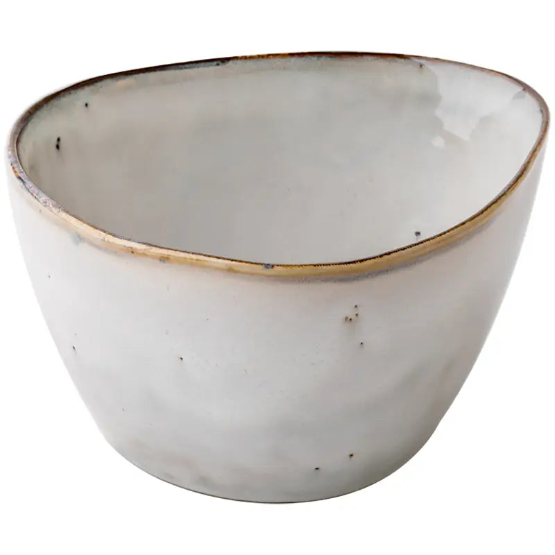 White ceramic bowl with rustic gold rim from Retro Irregular Flaw Salad Plates collection.