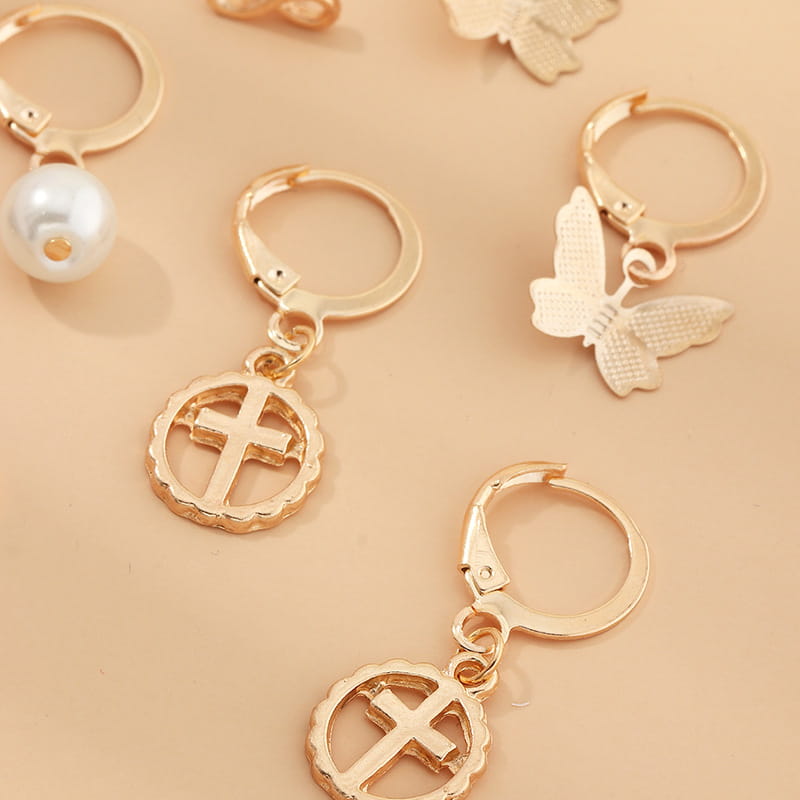 Gold-tone earrings with charms from Multi-Element Lightning Cross Small Earring Set.