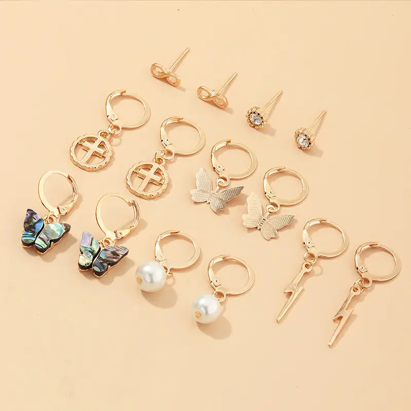 Assorted gold-tone earrings from Multi-Element Lightning Cross Small Earring Set.