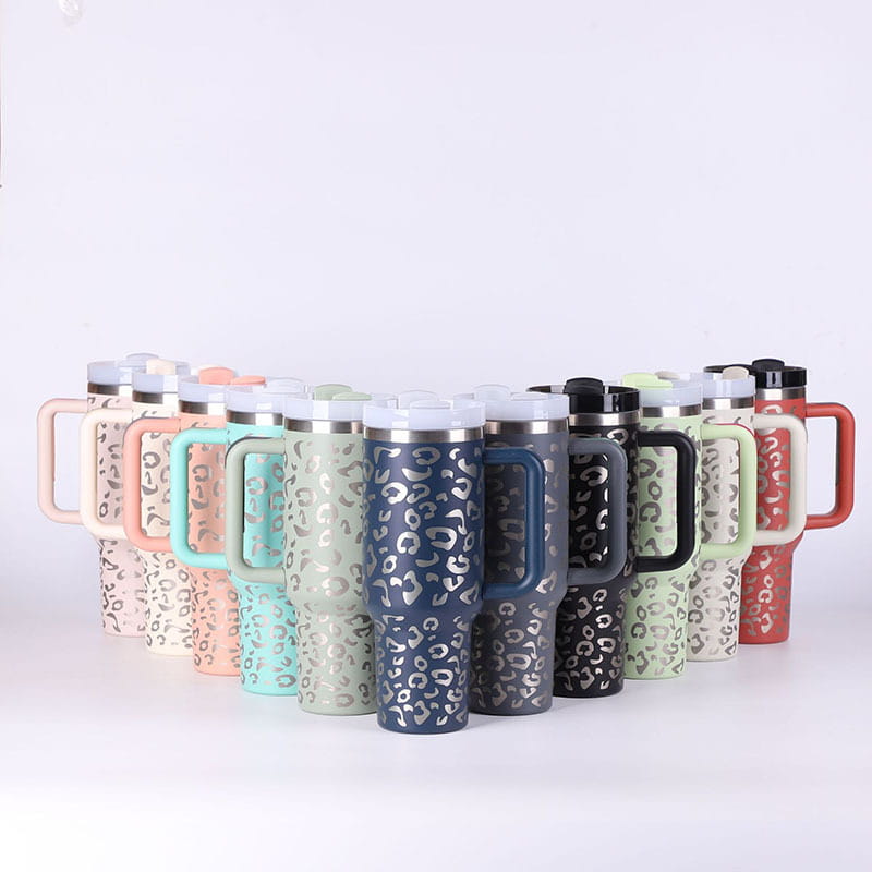 Colorful leopard-print handled tumblers for insulated travel and office use.