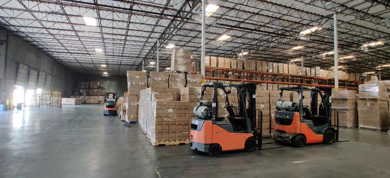 Warehouse Forklifts alongside 40 Oz Tumbler with Handle and Straw for versatile use.