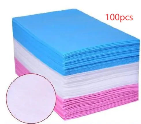 Stack of colorful disposable sheets for Physical Therapy bed use