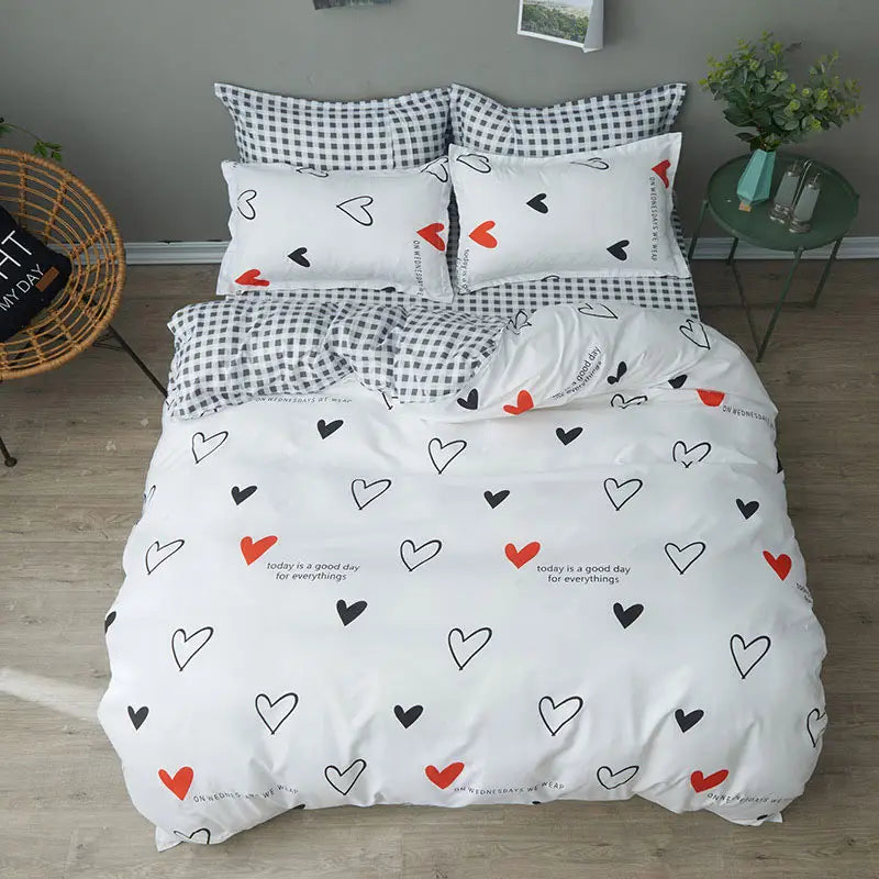 Heart-patterned bedding set in Simple set of four sheets for stylish bedroom decor.