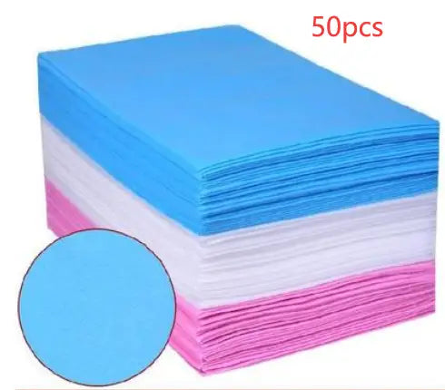 Stack of colorful disposable sheets for Physical Therapy Bed use.