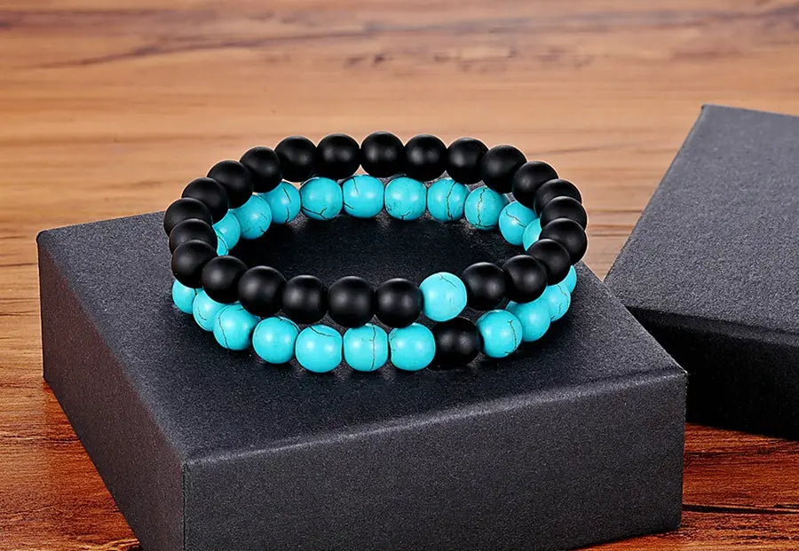 Beaded couple bracelets made of natural stone designed for yoga and style.