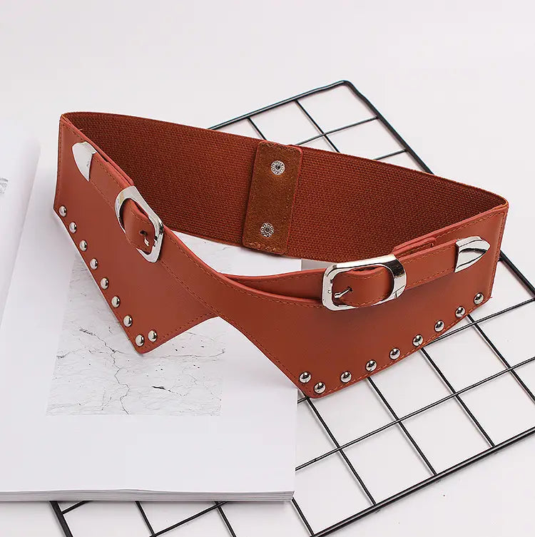Brown studded elastic belt designed for women’s skirts and decorative dresses.