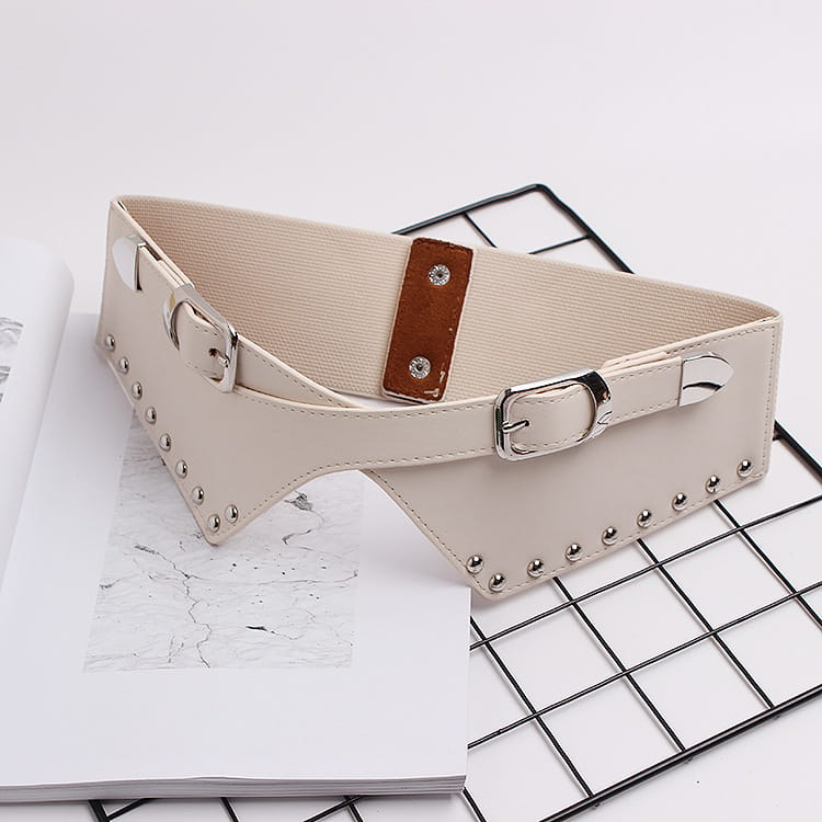Beige studded corset belt for women’s decorative dresses and skirts with elastic rivets.