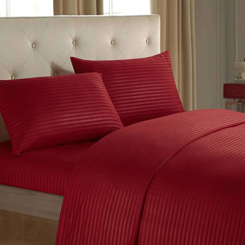 Red striped luxury bedding set showcasing fitted bed sheets in mono color style.