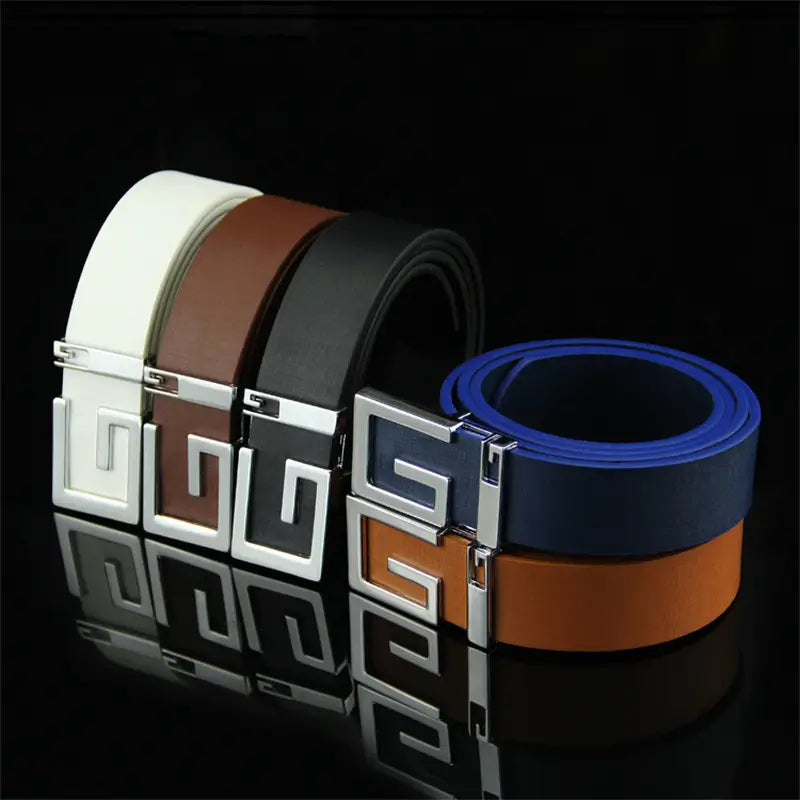 Assorted leather belts featuring silver G buckles for men’s and women’s fashion.