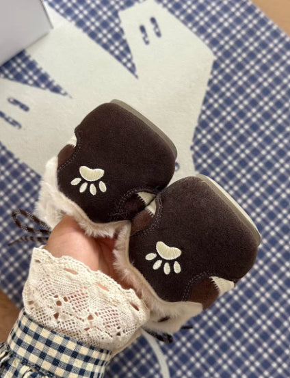 Brown Dachshund Wearing Plush Trainers