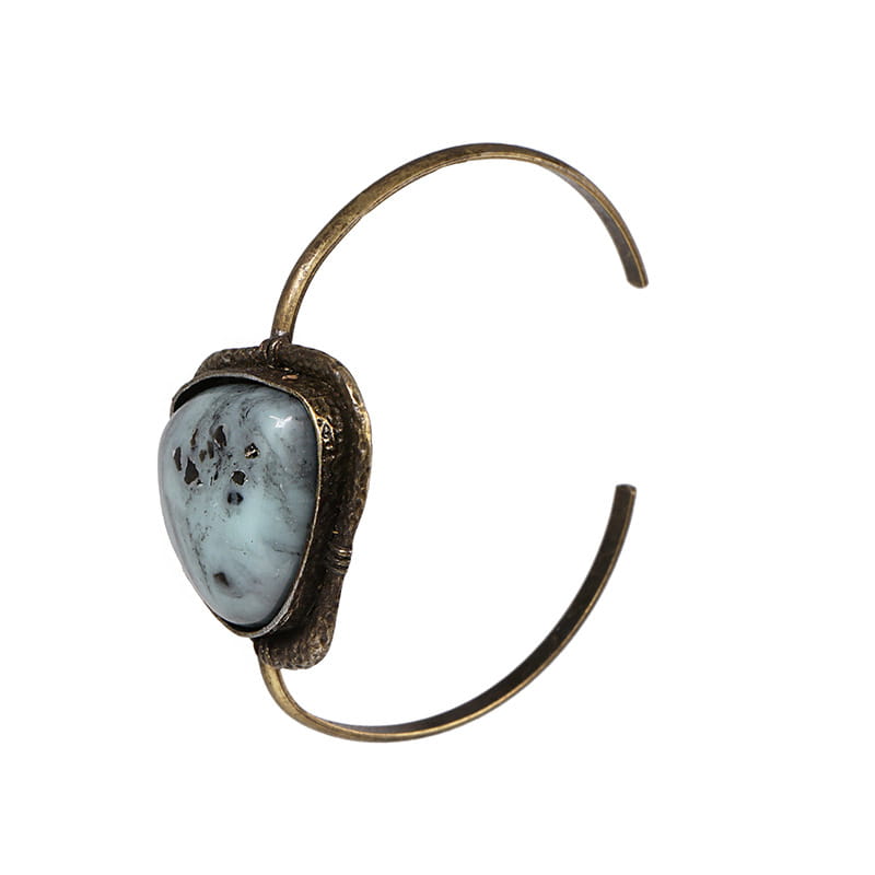 Silver cuff bracelet featuring a speckled stone from the Retro Bracelets collection.