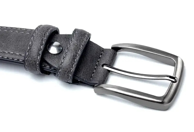 Gray leather belt with metal buckle for men’s vintage luxury jeans style.