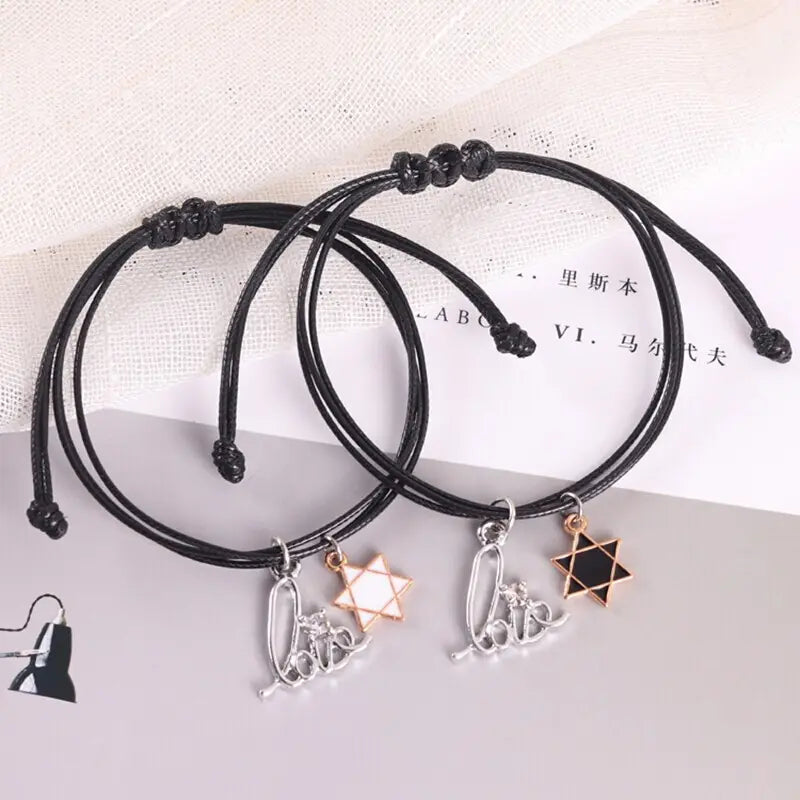 Matching couple bracelets featuring love and star charms for men and women.