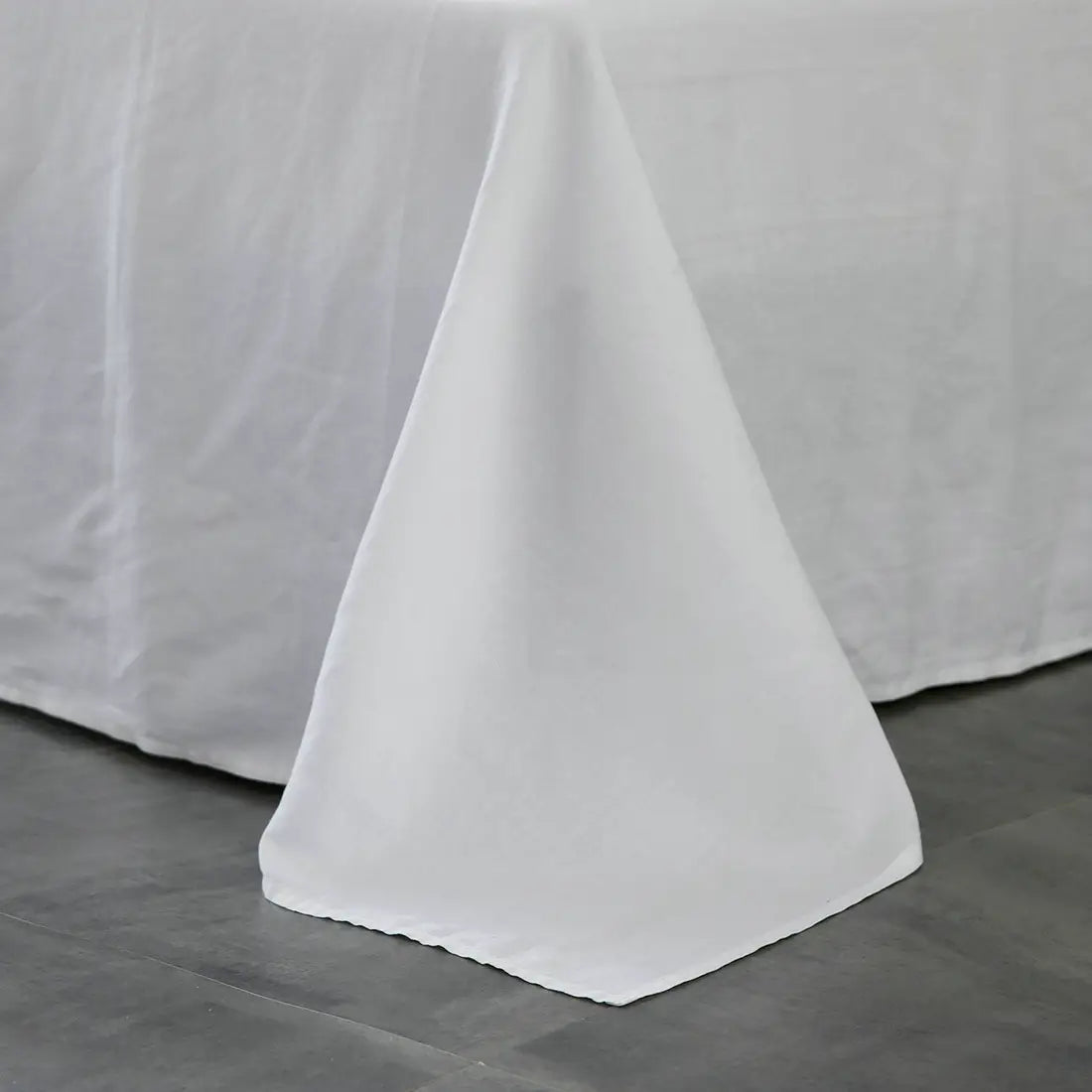 Elegant white bed skirt complementing Pure Linen Sheets for a serene bedroom aesthetic.