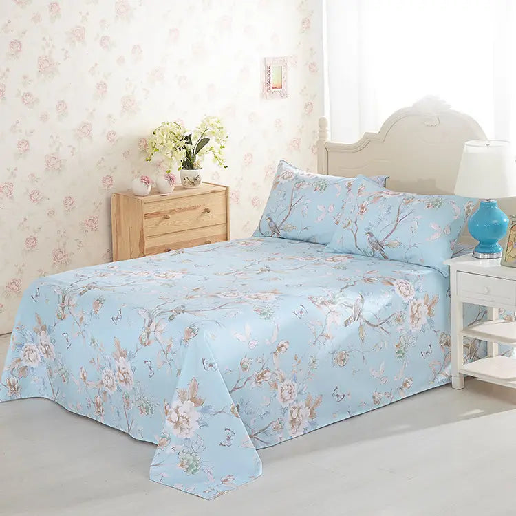 Floral patterned bedspread from Reactive Printed Cotton Sheets collection.