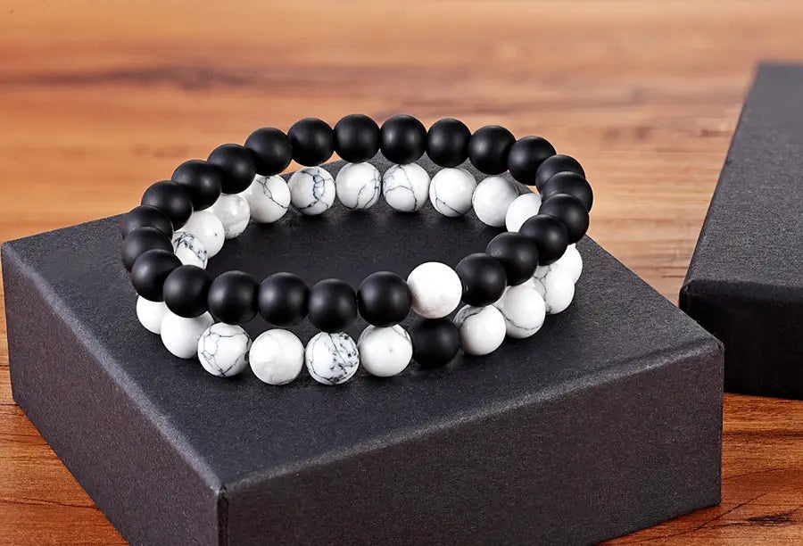 Two beaded bracelets from a set of Couple Bracelets Natural Stone Yoga Beaded Bracelets.