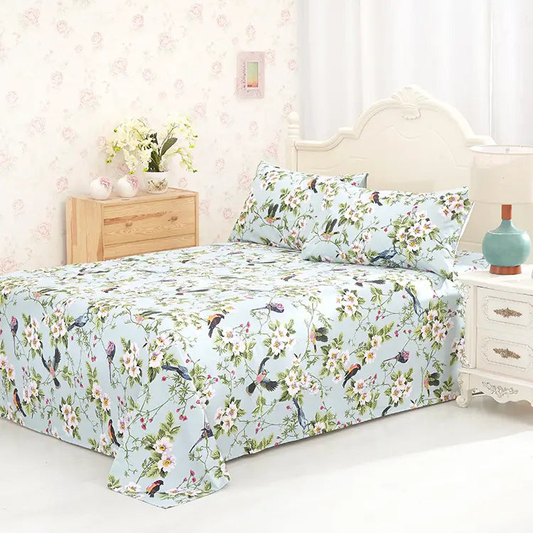 Floral and bird patterned Reactive Printed Cotton Sheets for elegant bedroom decor.