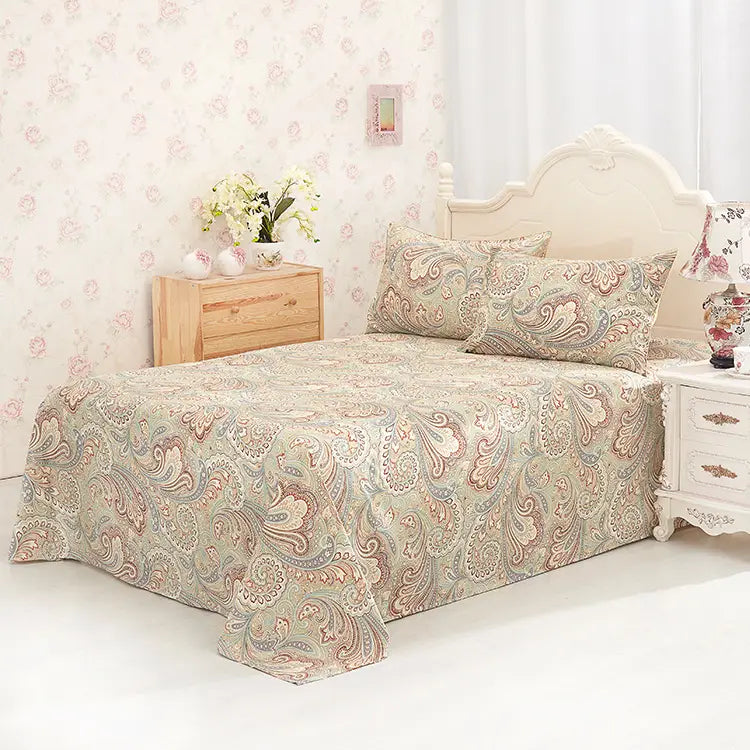 Paisley patterned bedspread on Reactive Printed Cotton Sheets for elegant bedroom decor
