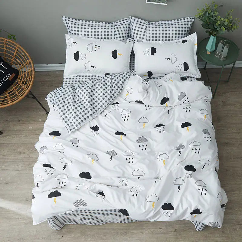 Cloud-patterned bedding set featured in a Simple set of four sheets for a stylish bedroom.