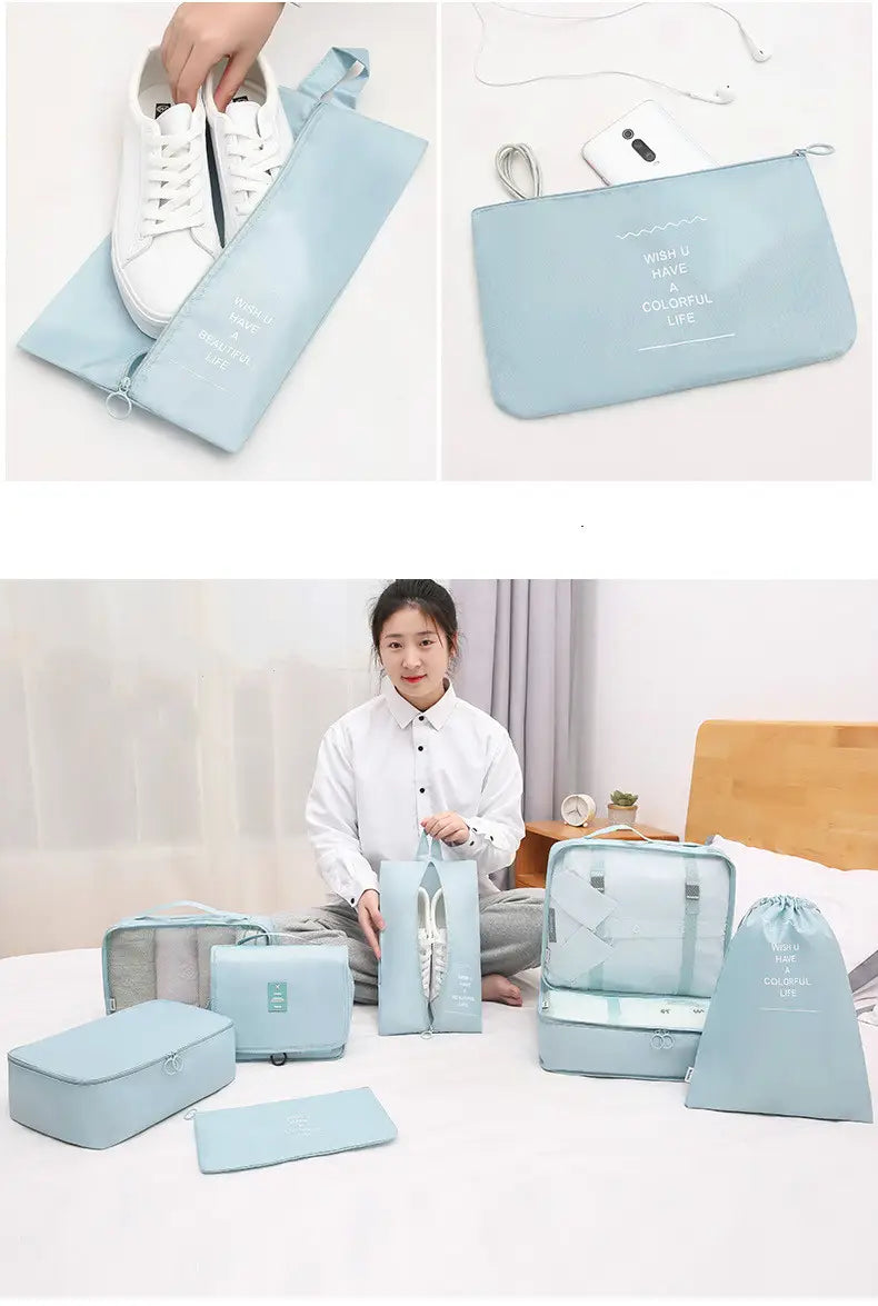 Light blue travel organizer set for efficient luggage storage and packing.
