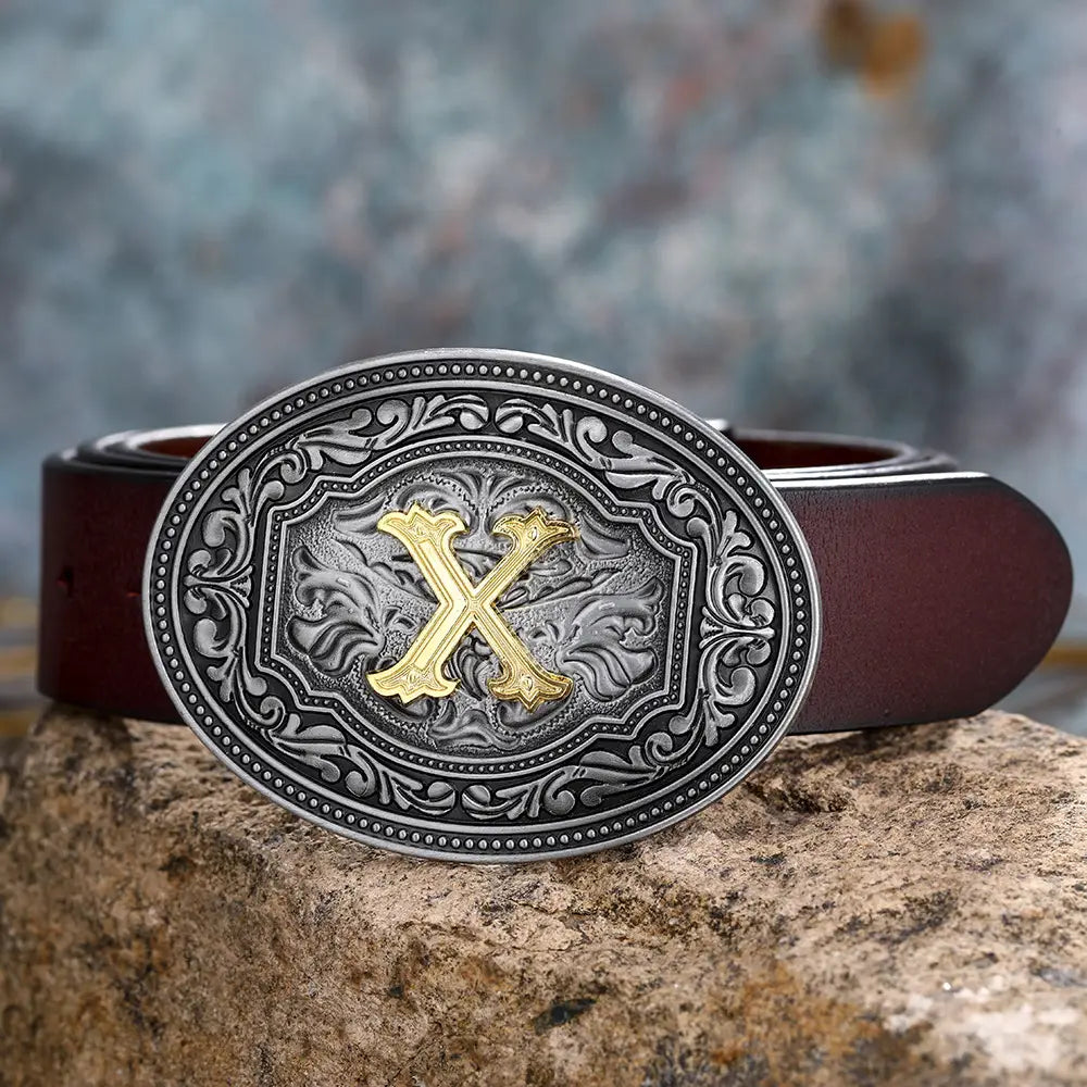 Brown leather belt featuring an ornate silver and gold floral letter buckle for all genders.