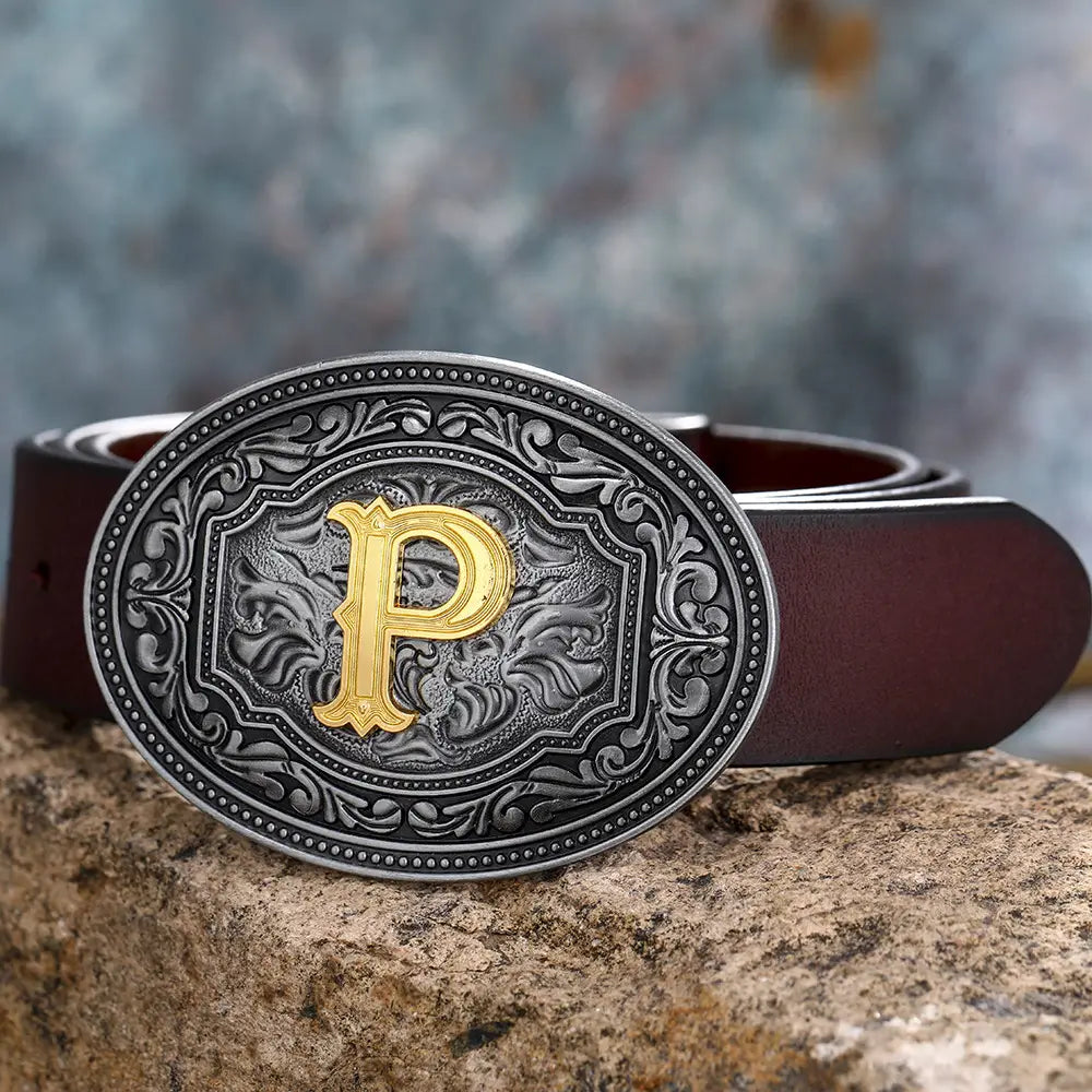 Brown leather belt featuring an ornate silver and gold ’P’ buckle, stylish accessory.