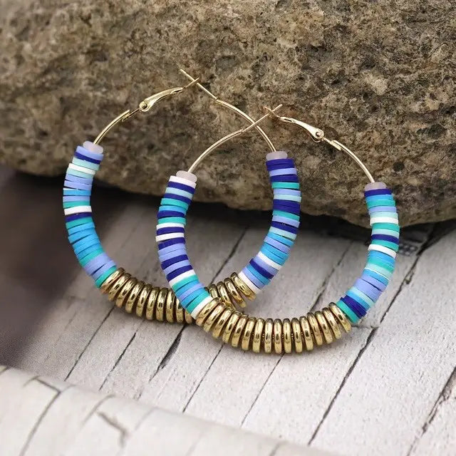 Colorful beaded hoop earrings featured in classic silver long ring design for women.