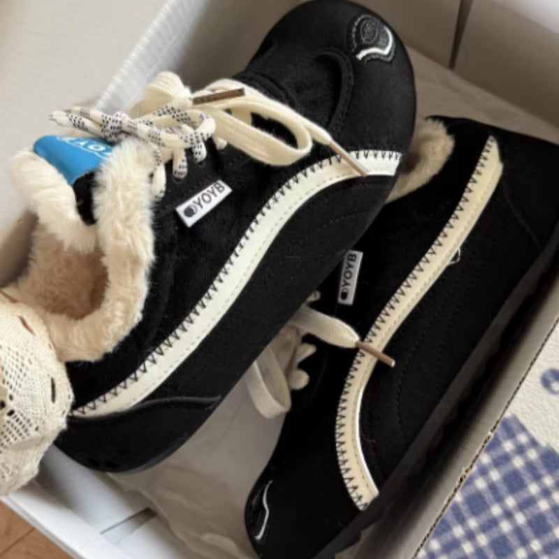 Brown Dachshund Wearing Plush Trainers