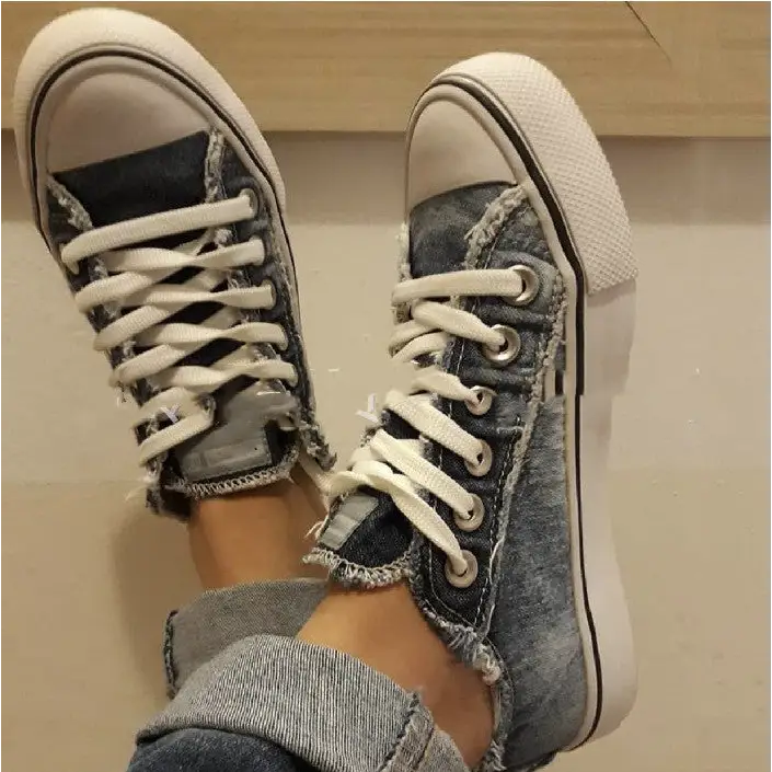 Distressed low-top canvas shoes