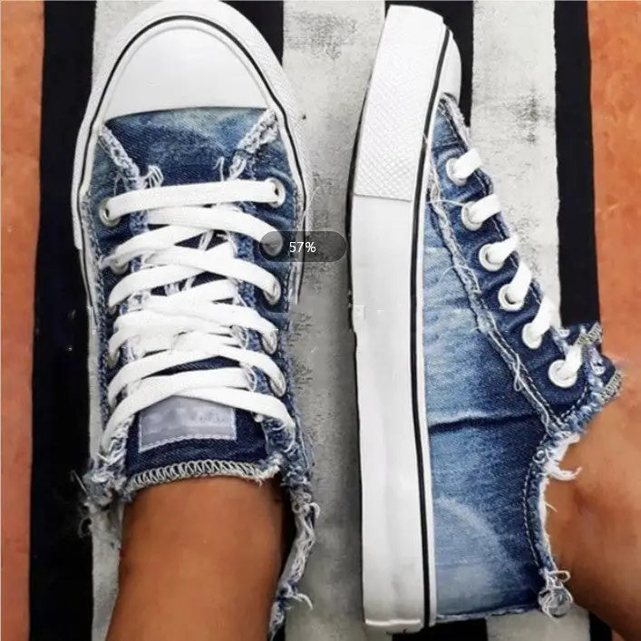 Distressed low-top canvas shoes