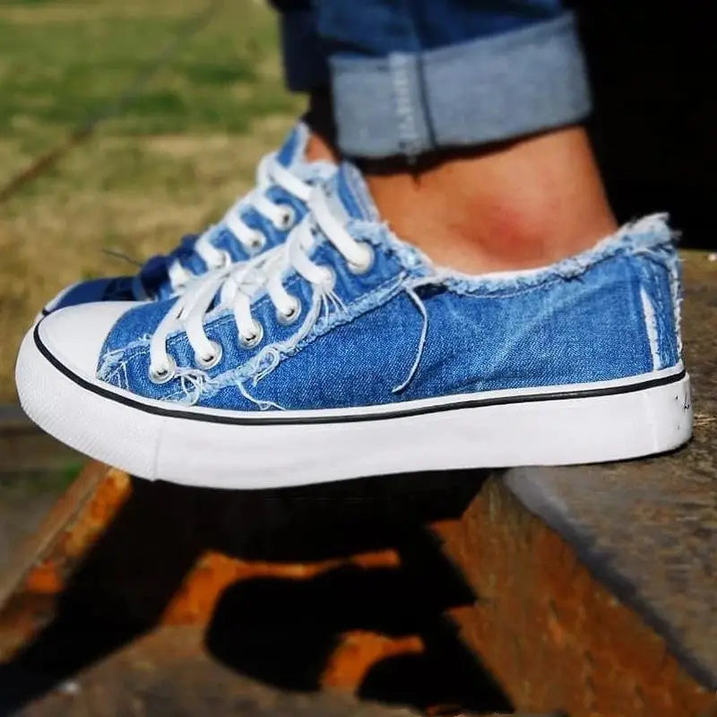 Distressed low-top canvas shoes