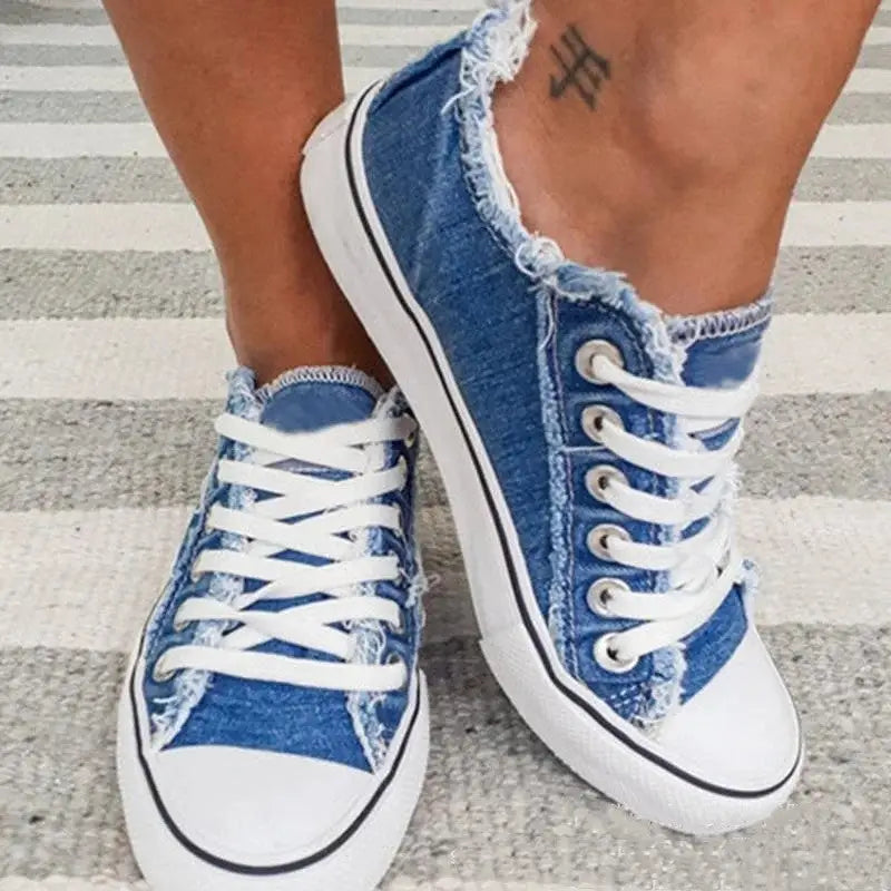 Distressed low-top canvas shoes