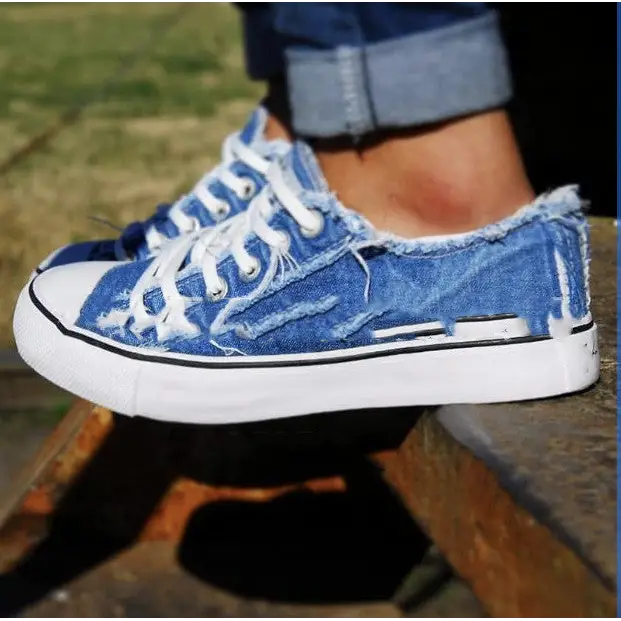 Distressed low-top canvas shoes