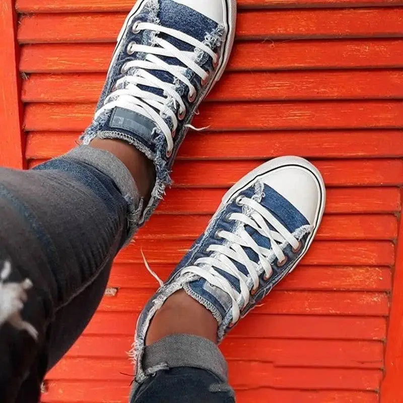 Distressed low-top canvas shoes