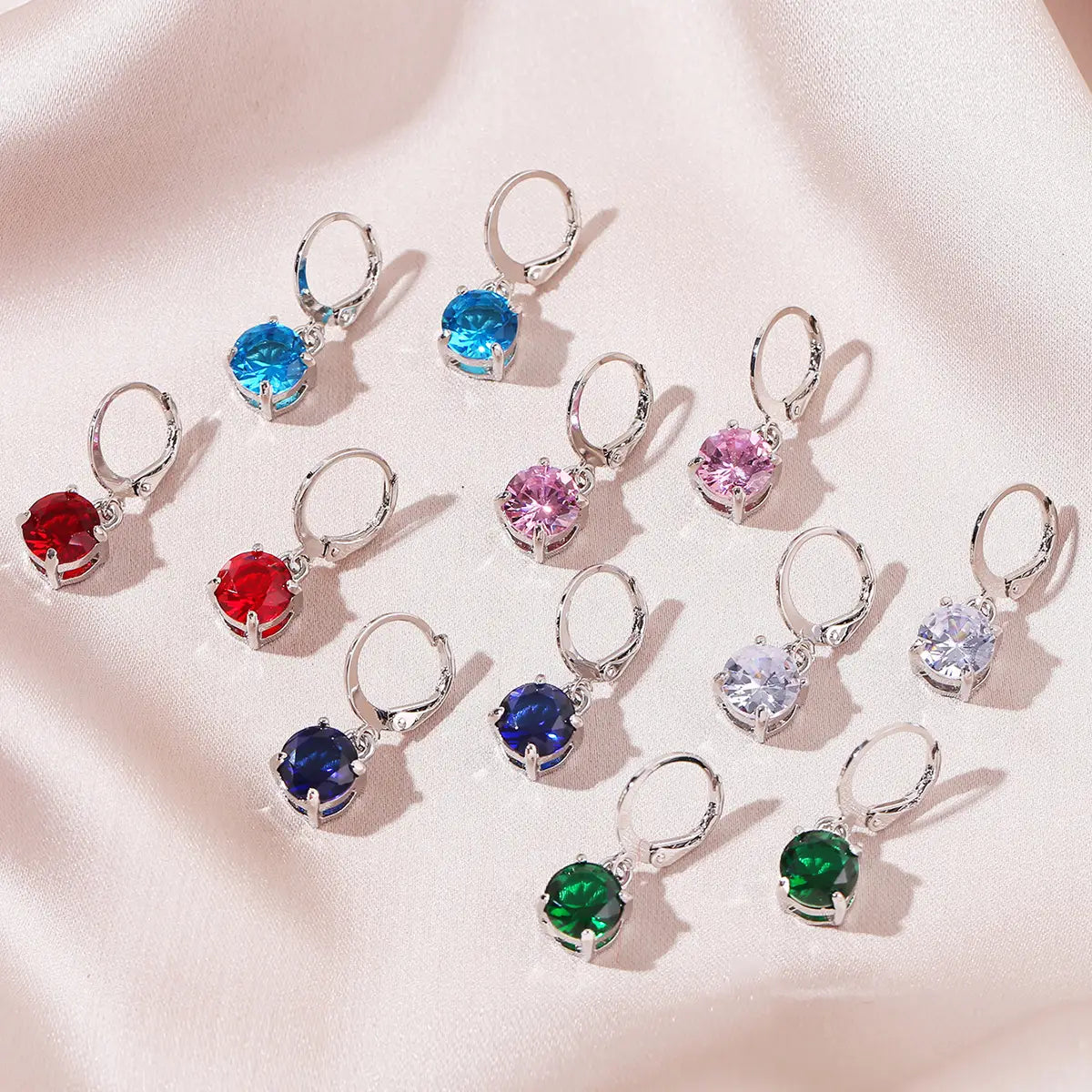 Colorful gemstone drop earrings in a Women’s Fashion Simple Stainless Steel Zircon Set.