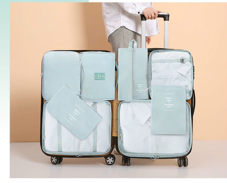 Open suitcase featuring 8-piece Set Luggage Divider Bag for organized travel storage.