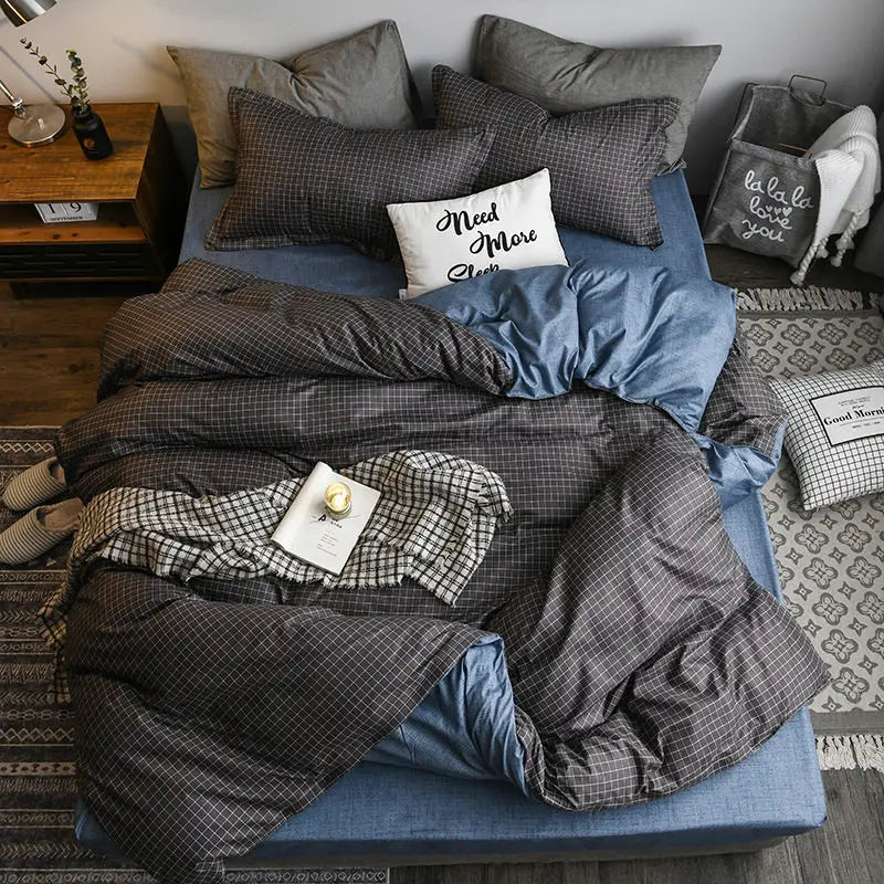 Cozy bed with plaid bedding in Bed Sheets Set Quilt Duvet Cover Bedding 4 Sets.